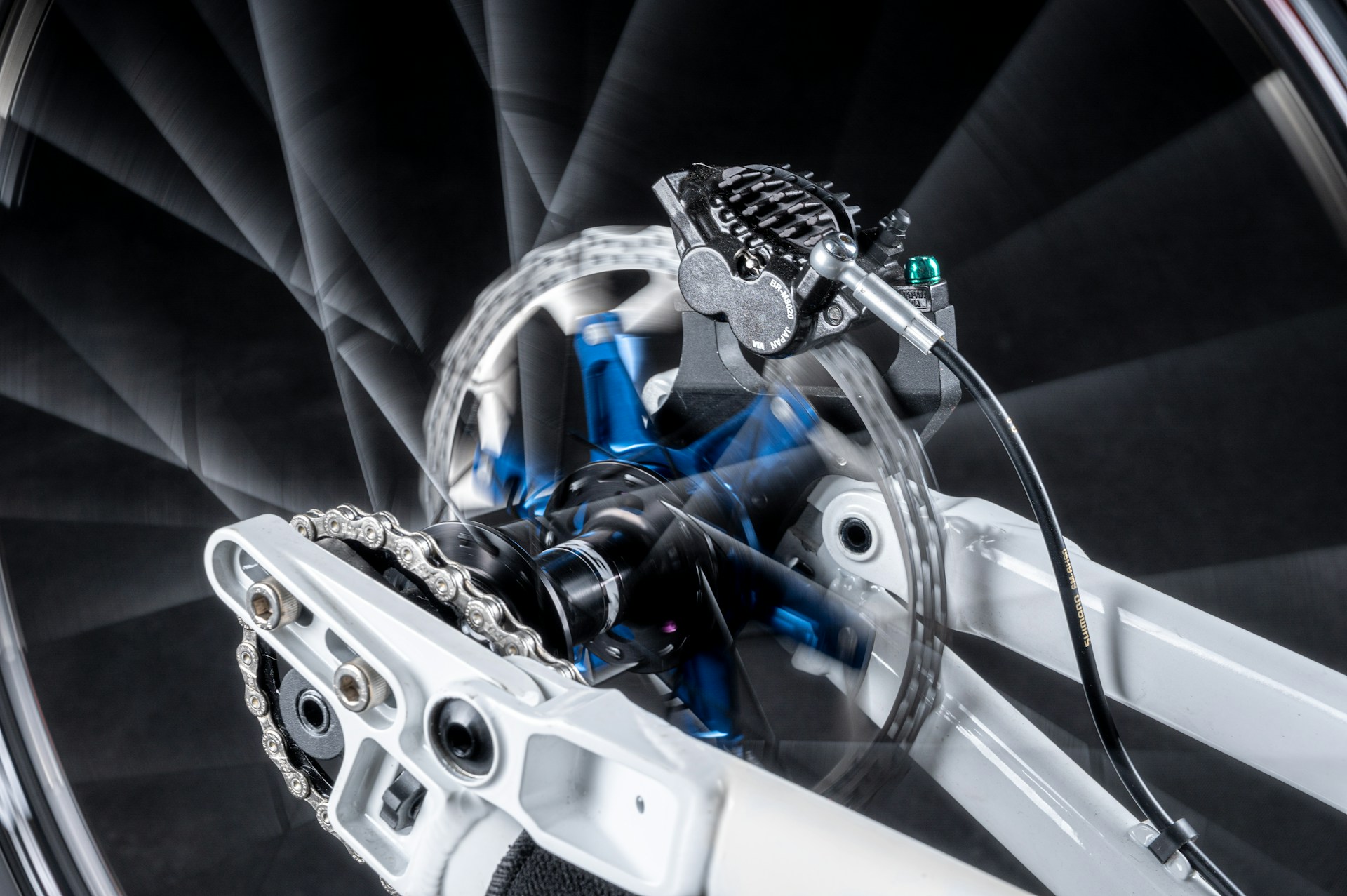 jan-kopriva-_q4LXDQWiko-unsplash A- lose up of a bikes front wheel